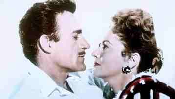 Olivia de Havilland e Gilbert Roland durante le prove per una scena del film