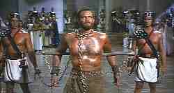 Portato in ceppi davanti al re