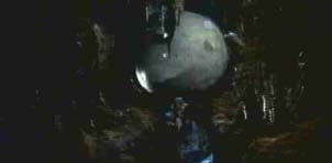 Indiana Jones inseguito da un masso rotante